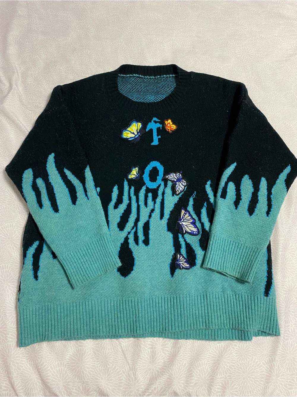 Black and Teal Flame-Accent Crew Sweater with Butterfly Embroidery